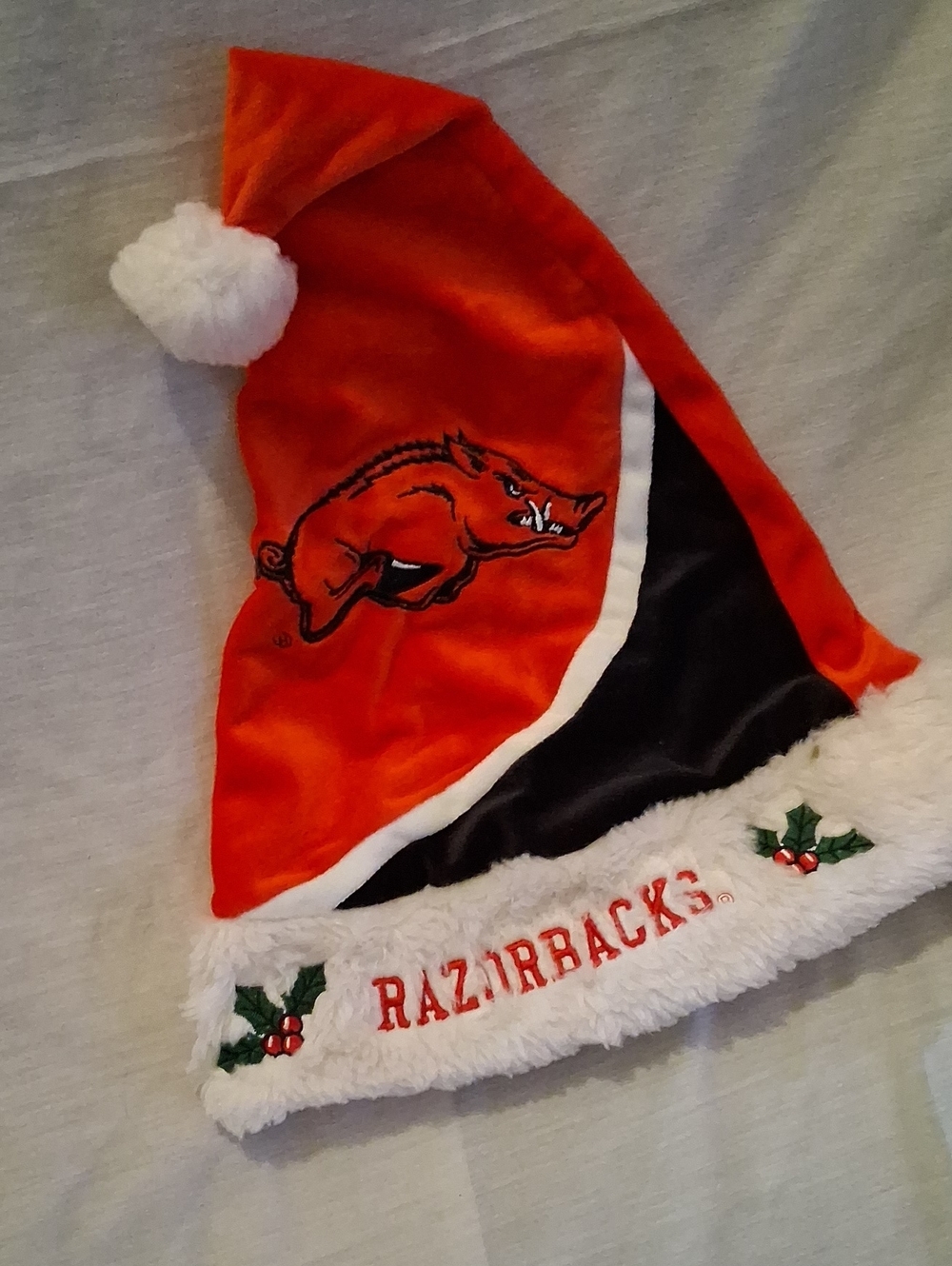 Forever Collectibles Red and White Razorbacks Holiday Santa Hat